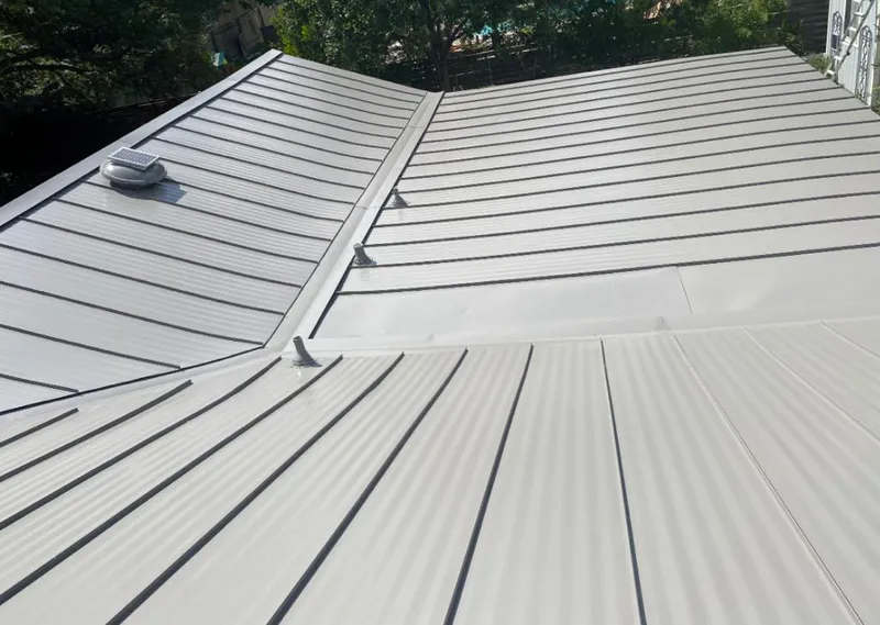 Solar attic fan installed on a metal roof for Roof Ventilation in Winnemucca